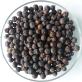 Juniper berries in glass